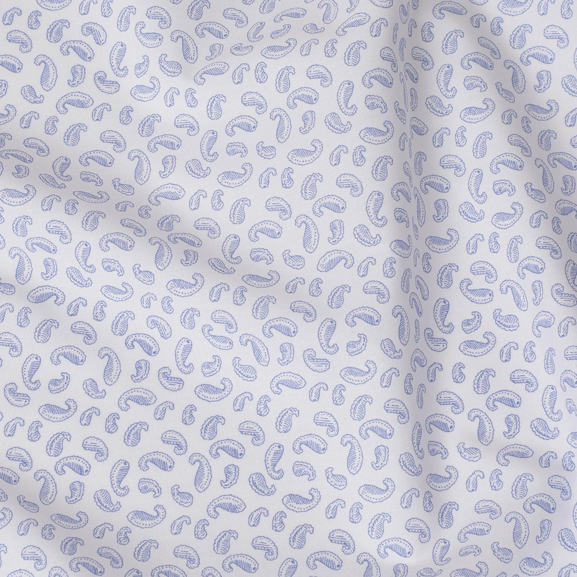 White blended cotton shirting fabric with blue print in paisley design-D16619